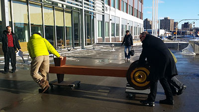 Transporting Stonehouse Bench to its temporary home at the Saskatoon Police Headquarters