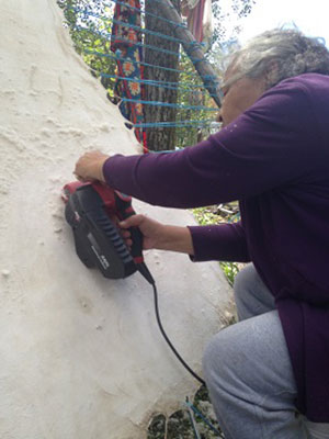 Ida Tremblay prepares hides for tanning