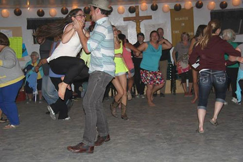 Karrnnel Sawitsky and Ameena Bajer-Koulack dancing at a kitchen party