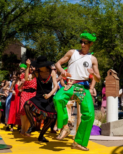 New Dance Horizons dancing down the yellow brick/canvas road toward Rapunzel's balcony at the 2015 Cathedral Village Arts Festival
