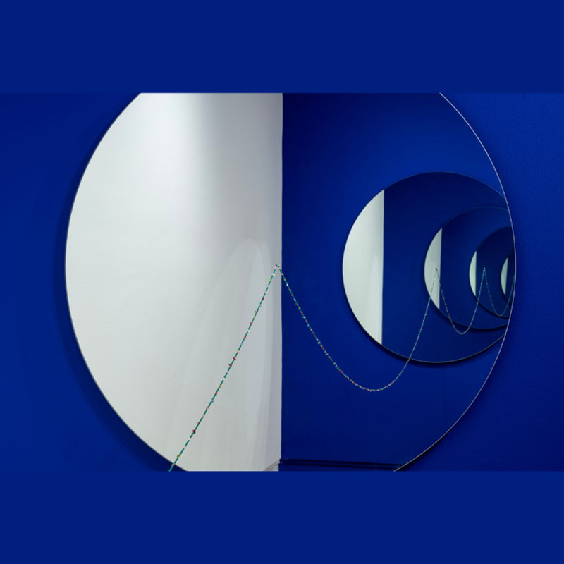 Audie Murray - Blue and white artwork of mirror and beads